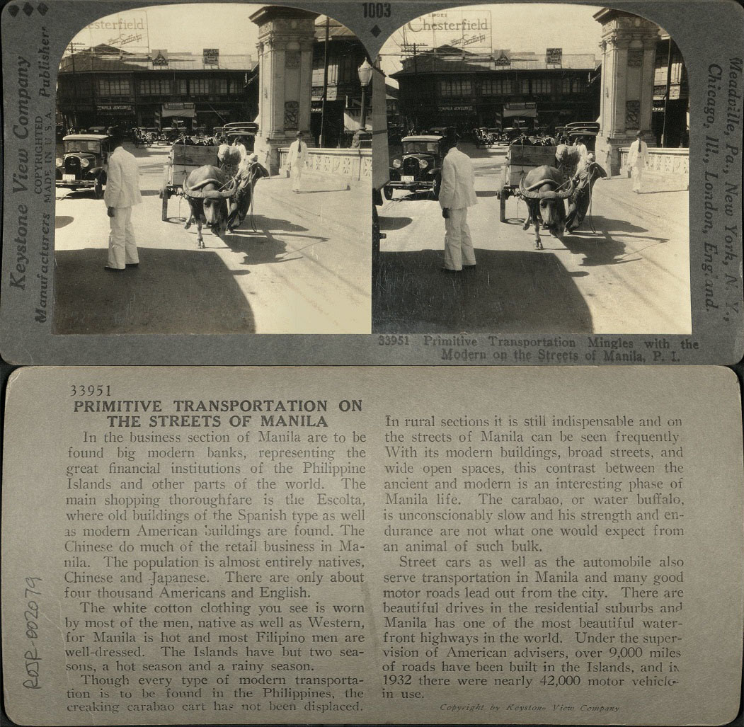 Primitive Transportation Mingles with the Modern on the Streets of Manila, P. I.